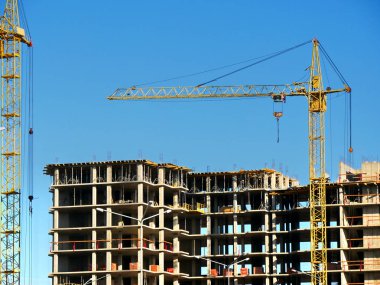 İnşaat site arka plan. İki Vinçler building yakınındaki. Beton