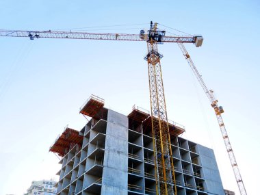 İnşaat site arka plan. İki Vinçler building yakınındaki. Beton