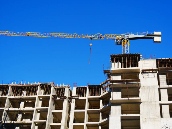 Concrete building under construction. Construction site. Industr