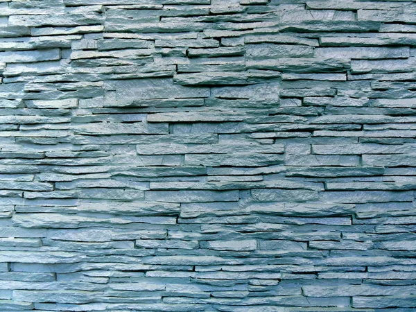Bina dekoratif taş örneği. Taş duvar arka planı. 