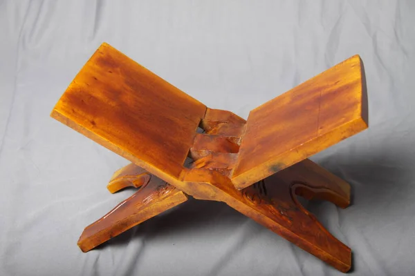 Wooden folding table that usually used for moslem to reading Quran