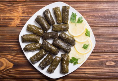 Dolma from grape of vines with rice  , meat and spices clipart