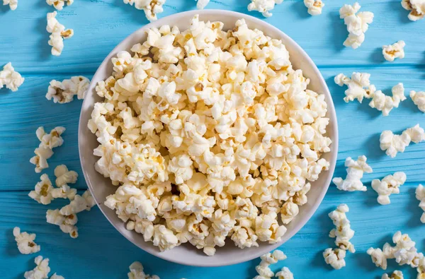 Popcorn snack in bowl . Pop corn ready to wath cinema