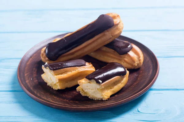 French dessert eclair with chocolate .