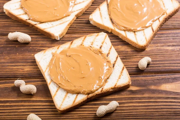 Peanut Butter Sandwiches Toasts Wooden Background — Stock Photo, Image