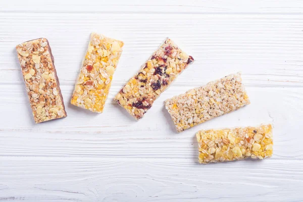 Sağlıklı ev yapımı atıştırmalık kahvaltı. Granola barlar. Yiyecek vegan enerji arka plan