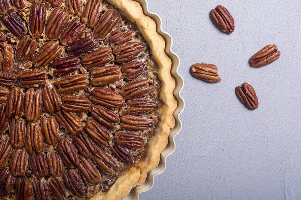 Autumn american pecan pie . Sweet dessert . Food background