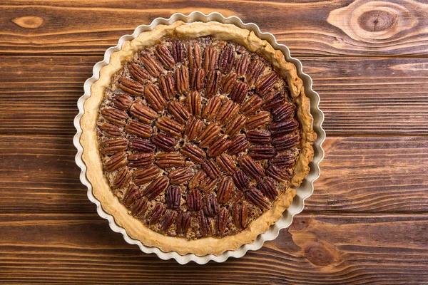 Autumn american pecan pie . Sweet dessert . Food background
