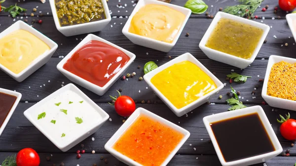 Set of different sauces in ceramic bowl — Stock Photo, Image