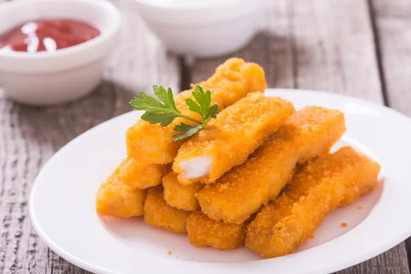 Fried fish sticks ( fingers ) or chicken nugget