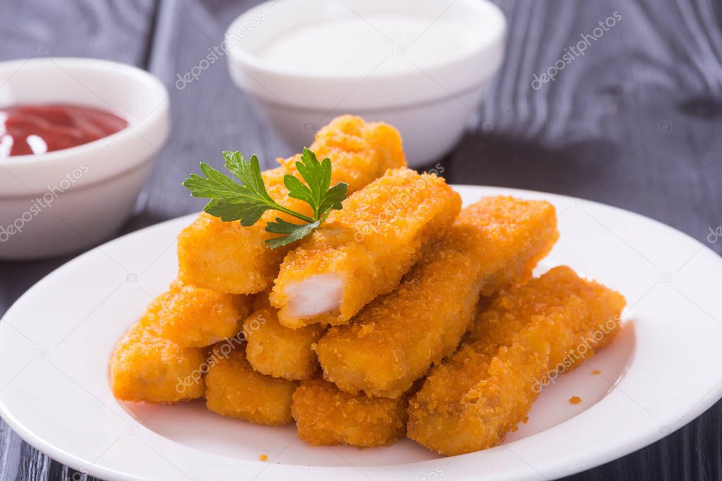 Fried fish sticks ( fingers ) or chicken nugget