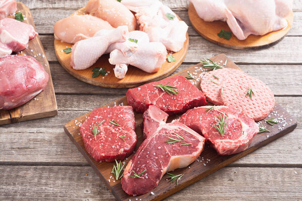 Assortment of meat and seafood . Beef , chicken , fish and pork