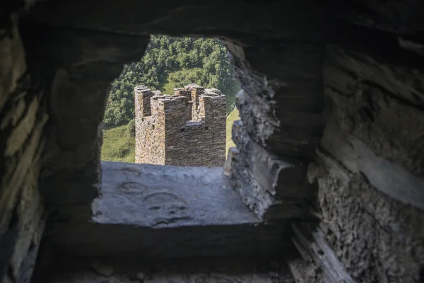 Tower Mutso fortress through a small window — Stock Photo, Image
