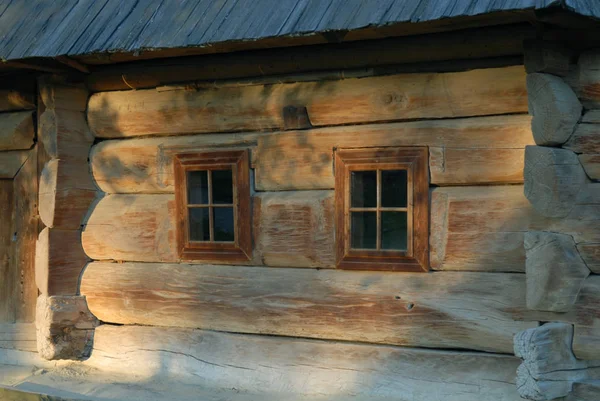 Wooden house with two windows — Stock Photo, Image