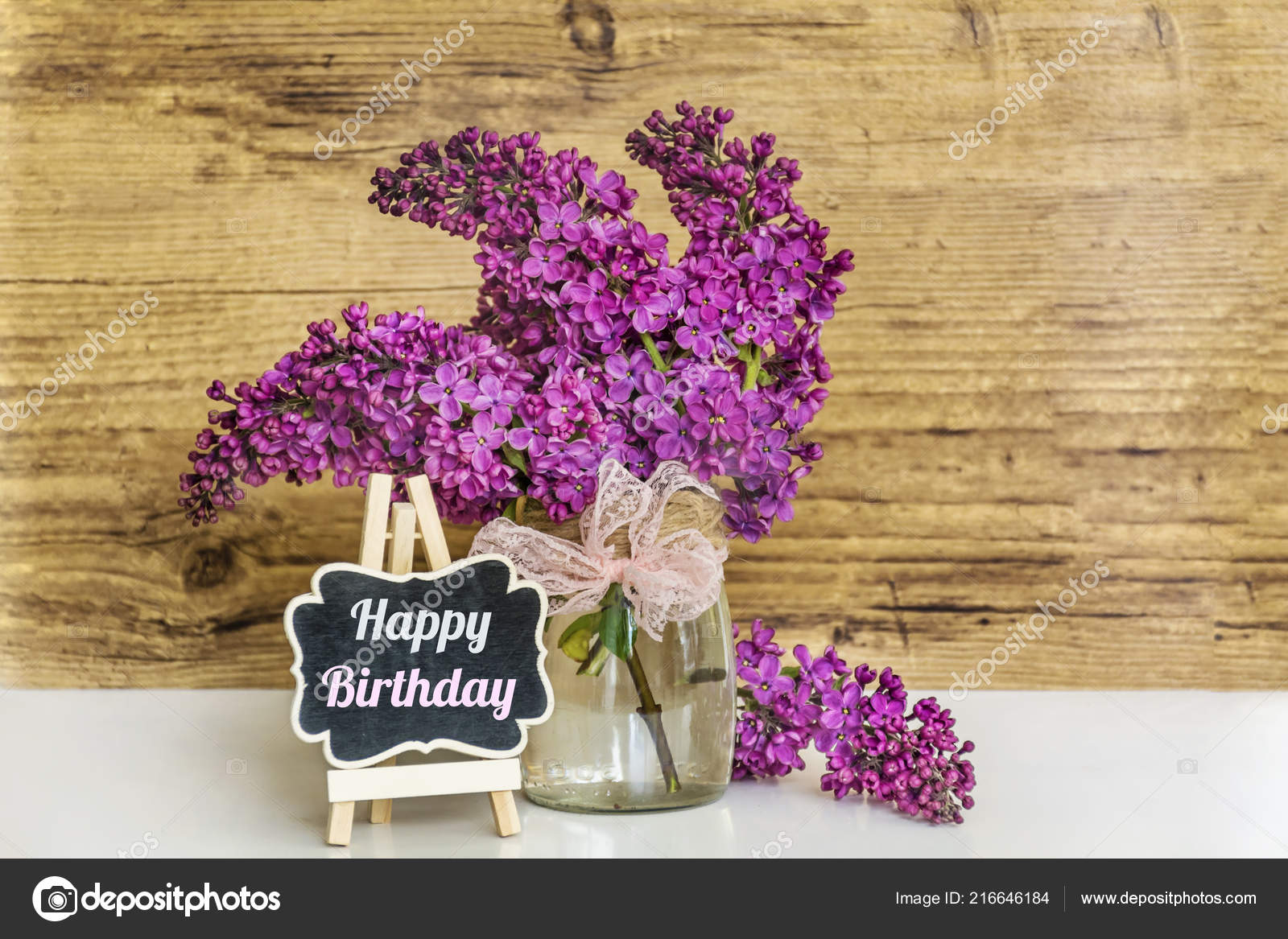 Spring Bouquet Lilac Pink Ribbon Happy Birthday Message Wooden Background  Stock Photo by ©brnmanzurova.gmail.com 216646184