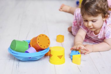 Baby Girl Playing with Colorful Educational Toy