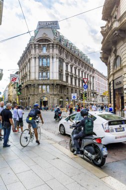 MILAN,ITALY -JUNE 27,2018 :Traffic in the Peak Hours in the Downtown of Milan ,Italy.Traffic in  the Fashion Capital of Italy  in the Rush Hour 