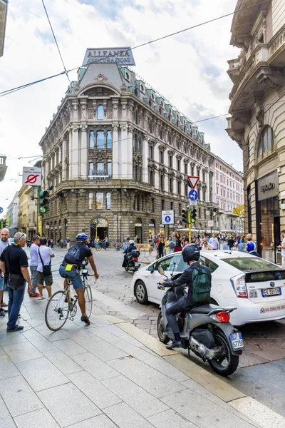 MILAN,ITALY -JUNE 27,2018 :Traffic in the Peak Hours in the Downtown of Milan ,Italy.Traffic in  the Fashion Capital of Italy  in the Rush Hour 