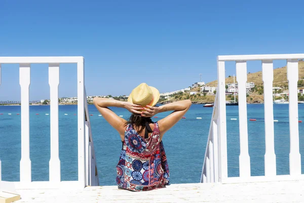 Beautiful woman relaxing on amazing background