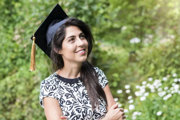 beautiful young woman college graduation