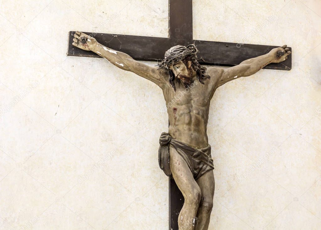 Jesus Christ Figurine Crucified on a Wooden Cross