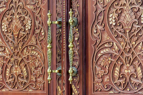 Ancient Wooden  Door with Golden Door Handle
