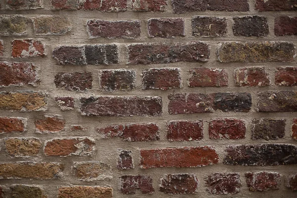 レンガ時代のブロックの赤い古い汚い痛んでいるテクスチャ壁の背景色 — ストック写真