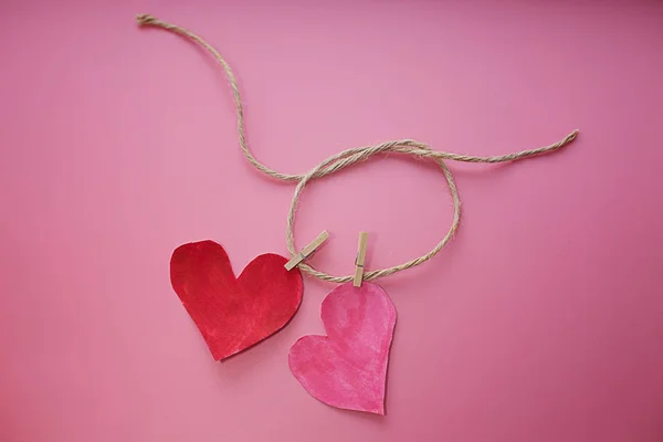 couple of love related hearts forever concept on pink background