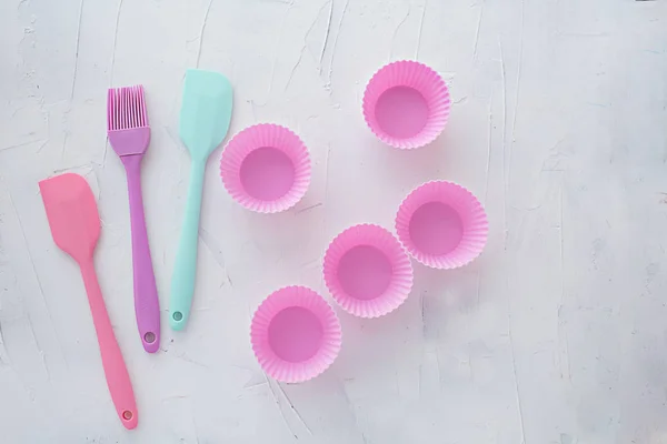 kitchen items for baking on a white textural background