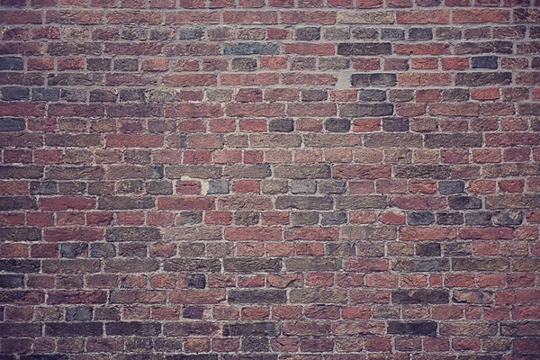 Hintergrund braun mehrfarbig dunkel Textur Wand aus Blöcken — Stockfoto