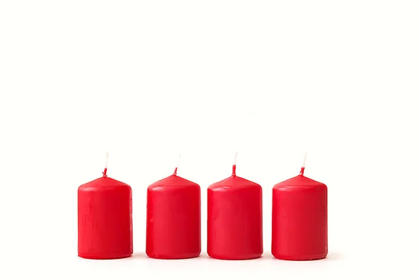 Red candles on white background — Stock Photo, Image