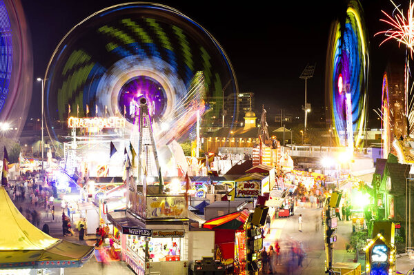 Carnival Rides in action at night