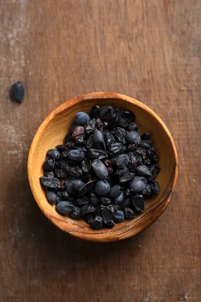 Condiment barberry in bowl, food flat lay