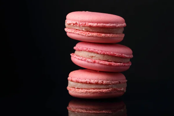 Stack of pink macaroons, food closeup