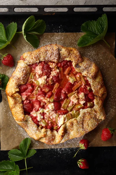 Pie with strawberries and cheese, food top view