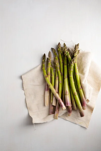 Bunch of asparagus on white top view — Stock Photo, Image