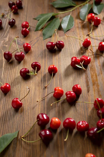 Fresh cherry on  wooden background, summer concept — Stock Photo, Image