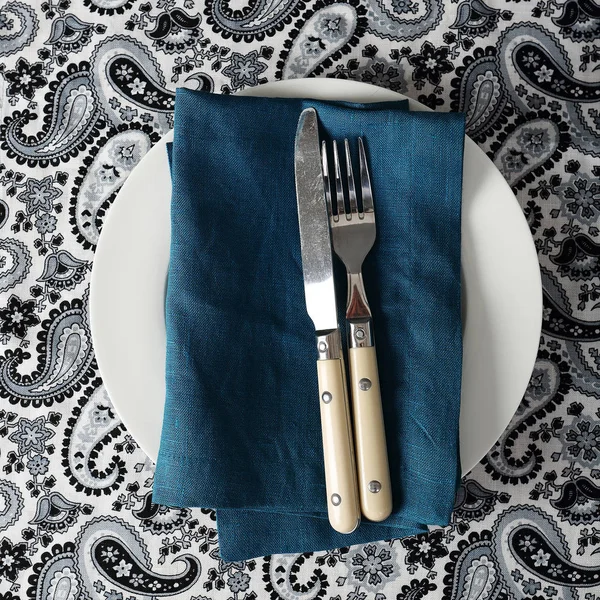 Fork and knife on table setting — Stock Photo, Image
