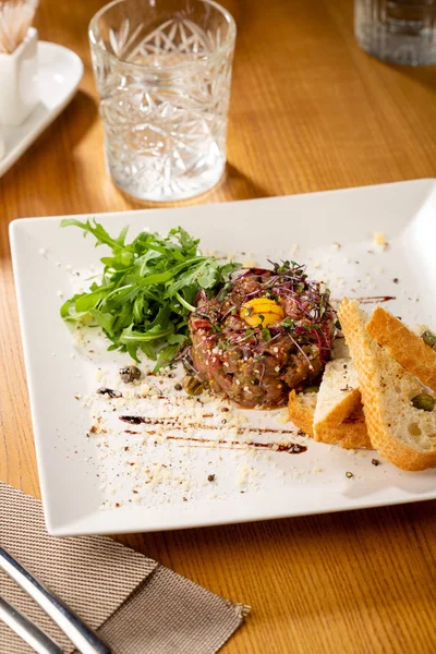 Beef Tartar with eggs with bread