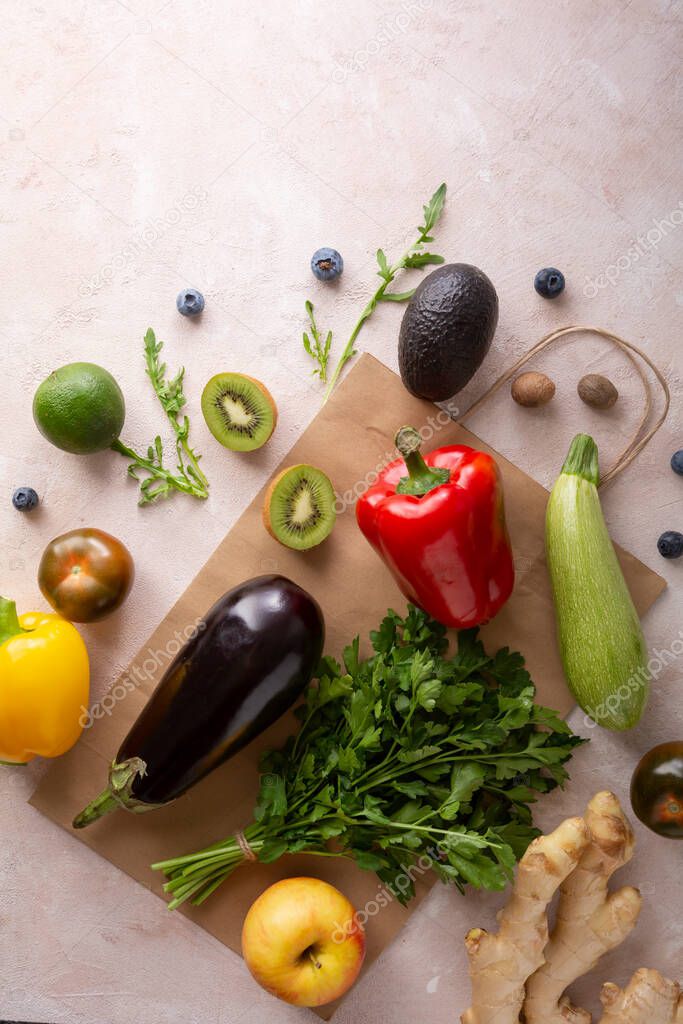 Organic vegetables on shopping paper bag