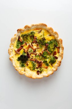 Open pie with mushrooms and broccoli clipart
