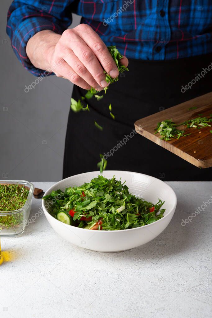 Cooking vegan food, salad in large bowl