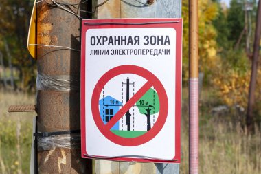 Bilgi işareti - korumalı güç hatları sınırları.