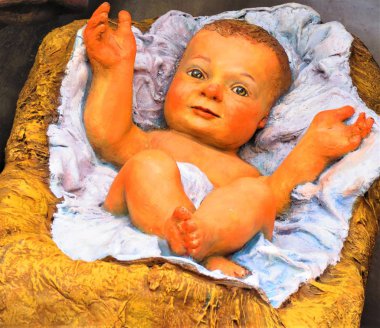 Bebek onun yemlik. Doğum sahnesi.