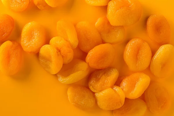 Σωρού Φρούτα Αποξηραμένα Βερίκοκα Πορτοκαλί Φόντο — Φωτογραφία Αρχείου