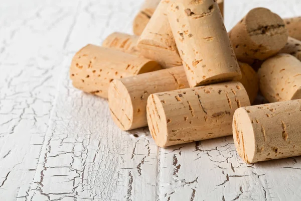 Heap Unused New Brown Natural Wine Corks White Wooden Board — Stock Photo, Image