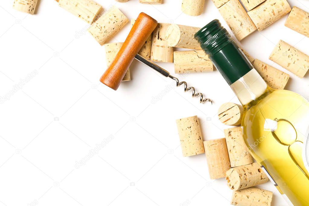 Corkscrew with wine cork and bottle of white wine on white background, flat lay top view with copy space