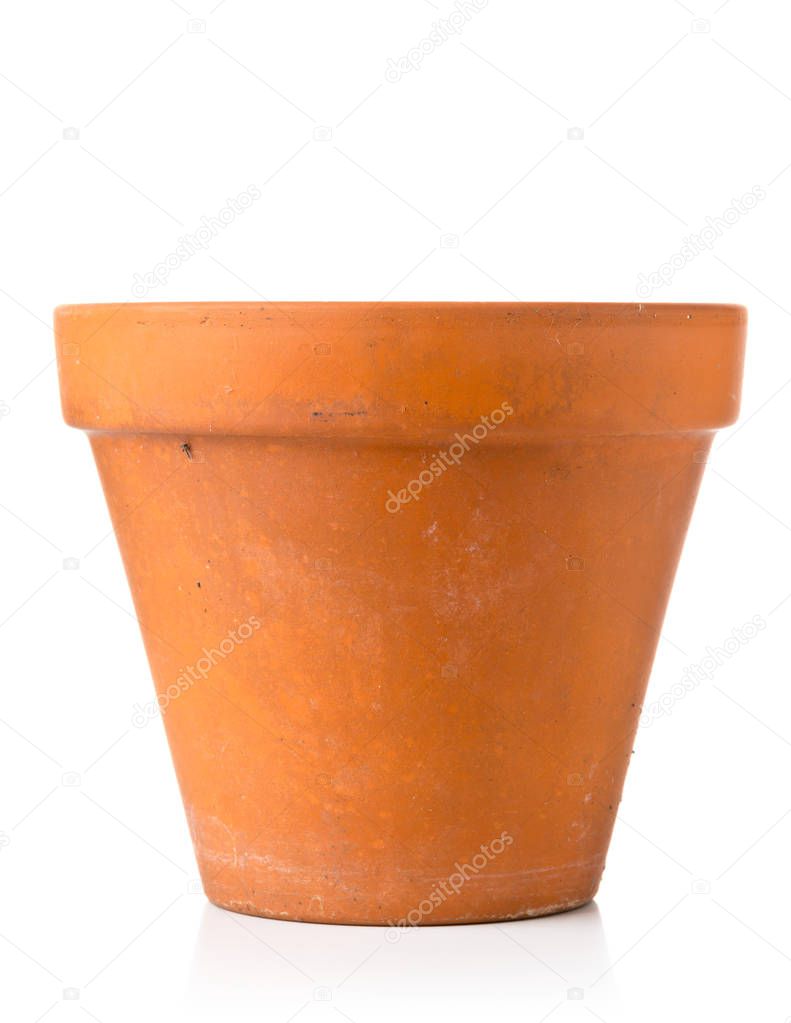 Single empty, used terracotta planting pot over white background