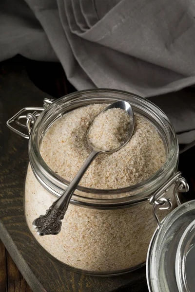 Psyllium Husk Halom Néven Isabgol Üvegedénybe Fém Kanállal Háttér Sötét — Stock Fotó