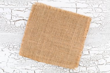 Co ile beyaz rustik ahşap mutfak masası üzerinde Çuval kumaş bez